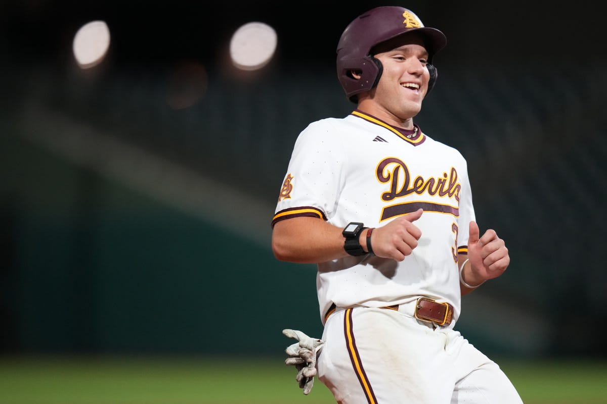 An Arizona State player in the home 'Devils' uniform jogs with a grin on the basepaths during the same NCAA regional matchup that saw a bat flip lead to an ejection.