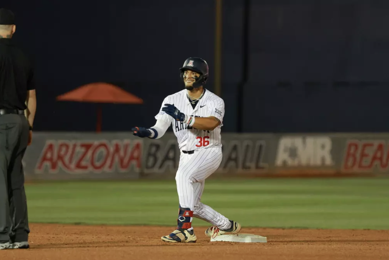 An Arizona baserunner reacts while standing on second base in the Wildcats' season-ending game at Oklahoma State.