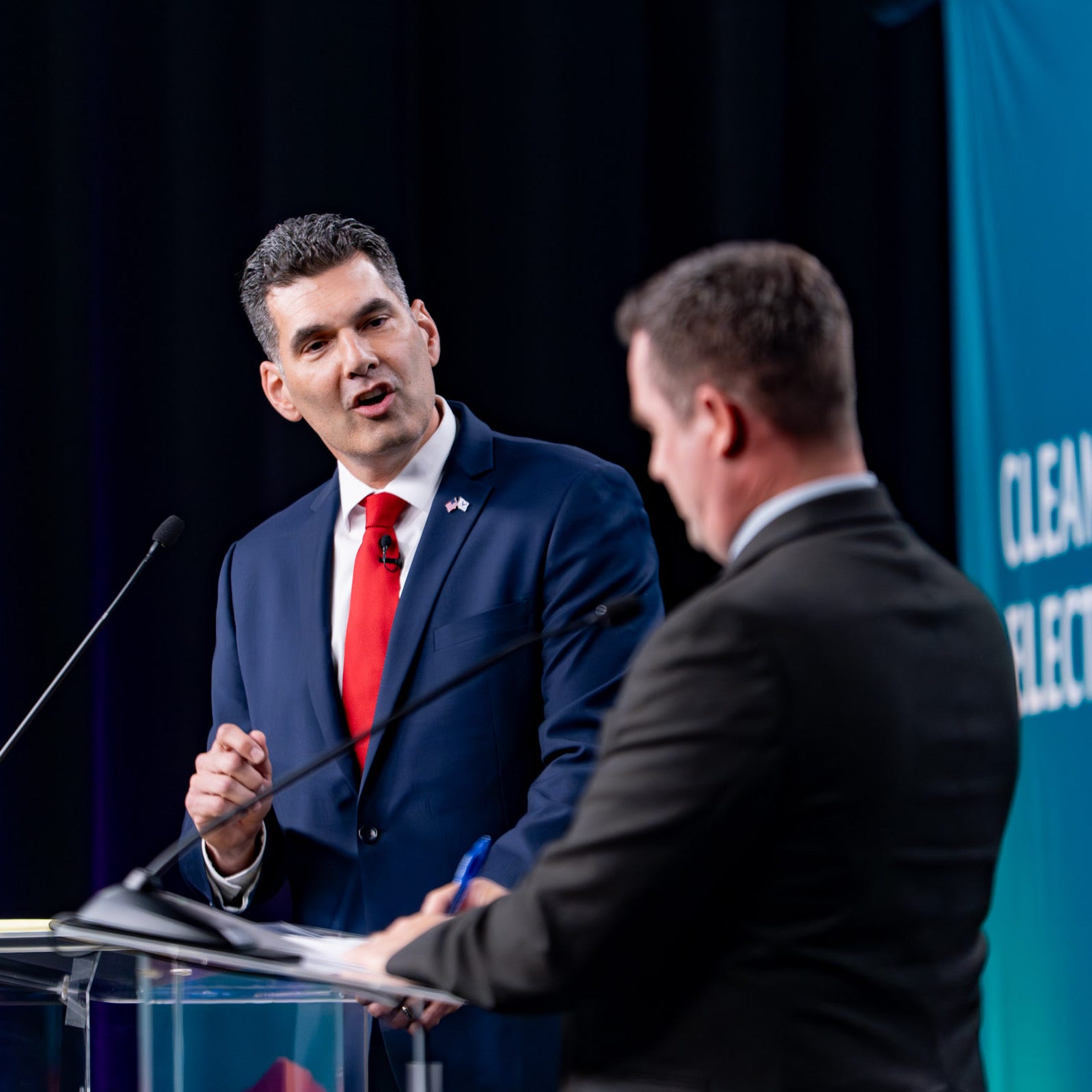 A Republican candidate speaks at a debate, pressing his case to voters ahead of Arizona’s July primary.