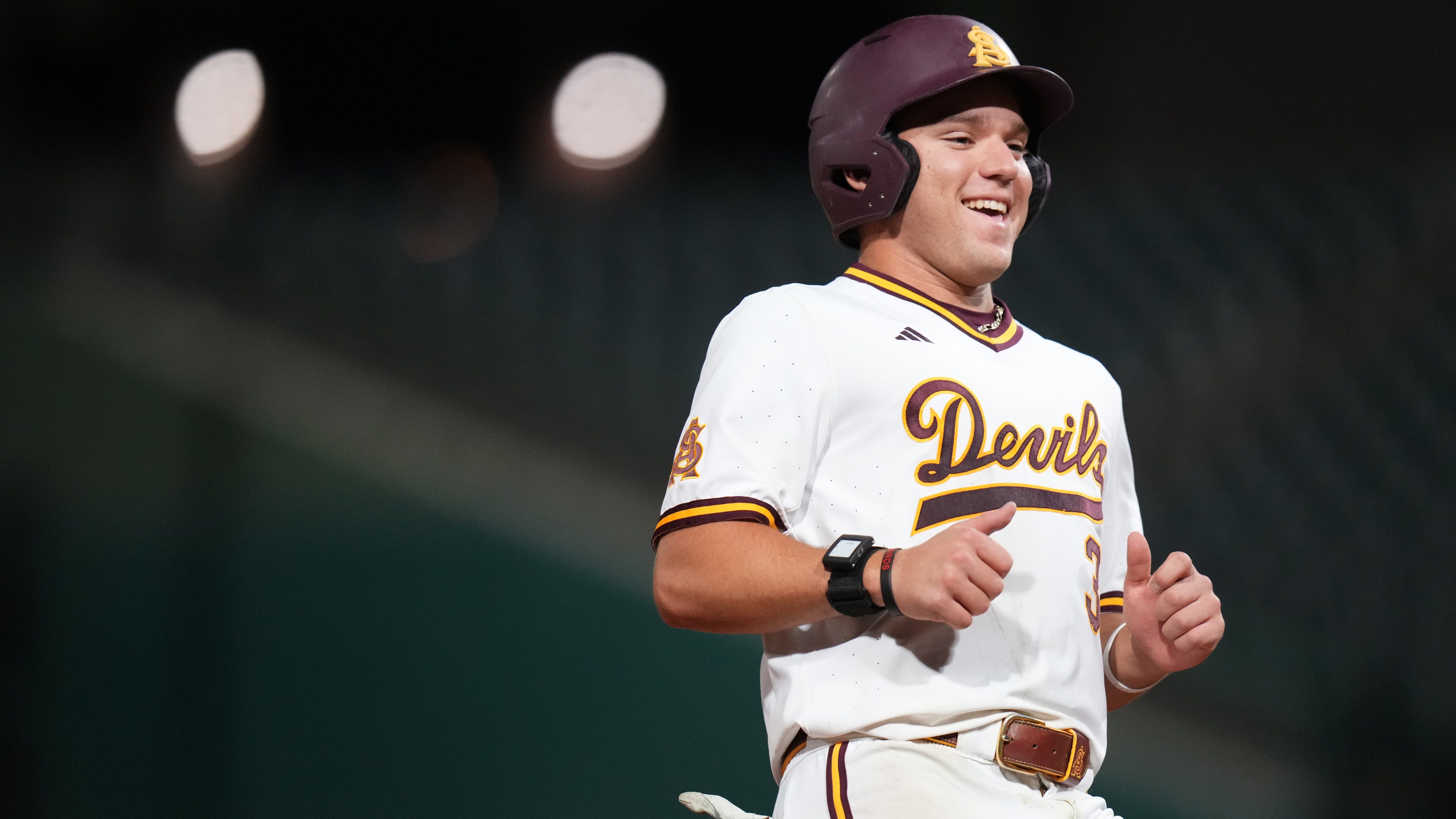 An Arizona State player in a Sun Devils uniform smiles on the field — the athlete was recognized this week with a national award.